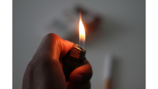 A lighter in the hand